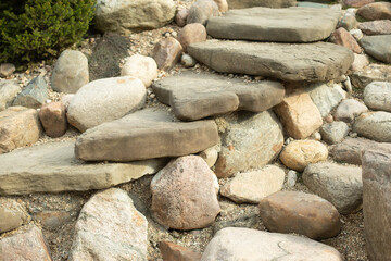 Stones in park. Rock garden. Landscape details. Landscaping in park.
