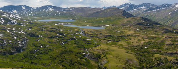 Mongolian rugged mountains with beautiful lakes, cloudes