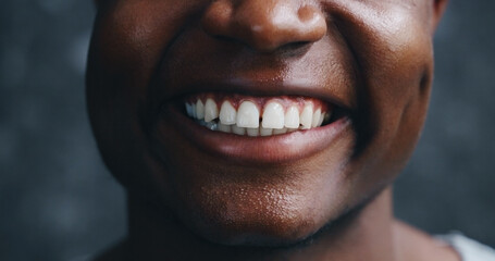 Black man, mouth and happy with teeth for dental care, oral hygiene and whitening in bathroom. Person, smile and closeup in home for gum cleaning, grooming and orthodontics for selfcare with pride