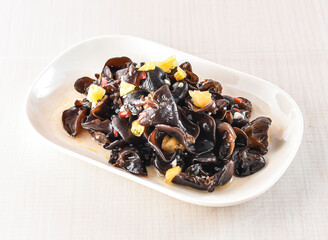 Hot and sour cloud fungus served in tray dish isolated on white background side view of hong kong food