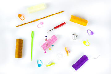 Sewing thimbles, bobbin and needle