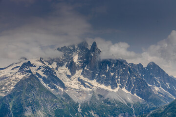 Nasty weather in the Alps. Dark cloudy sky and overcast before the rain and storm. Stormy weather....