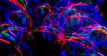 Background abstract image of various colorful lines on a black background