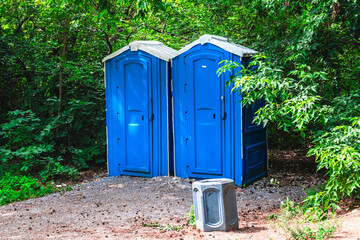 Blue public toilets in the public park