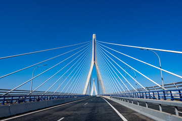 Fototapeta premium View on cable-stayed bridge with high pylons&nbsp;across the&nbsp;Bay of Cadiz, linking&nbsp;Cadiz&nbsp;with&nbsp;Puerto Real&nbsp;in mainland Spain