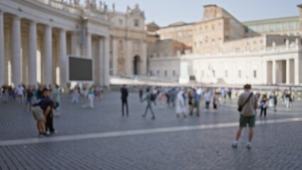 Blurred people in vatican city square with historic architecture in the background captured in soft bokeh on a sunny day highlighting tourist activity and cultural atmosphere.