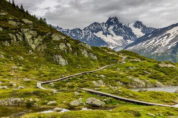 Nasty weather in the Alps. Dark cloudy sky and overcast before the rain and storm. Stormy weather....