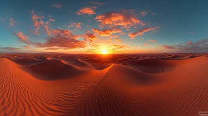 Vibrant sunset over rolling sand dunes in a vast desert landscape.