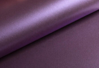 Deep purple paper texture with a pearlescent, metallic finish and a glowing gradient. The glossy,...