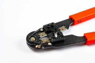 Modular plug crimper for RJ45 on white background. Close up.