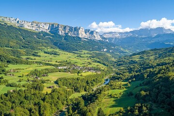 Fototapeta premium Captivating aerial shot capturing the swiss and french alps majesty.