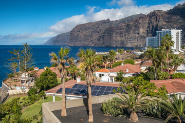 Luxury villas with palm trees in Los Gigantes in Tenerife, Spain