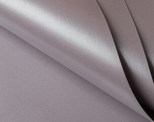 Soft gray paper texture with a metallic finish in taupe, sepia, and grayish pink with a subtle pink...