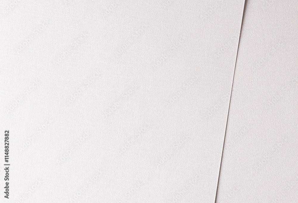 Fototapete Soft white paper texture with a glossy satin finish and subtle pearlescent shimmer. The delicate fabric-like surface blends cool and warm tones, creating a refined and minimalist
