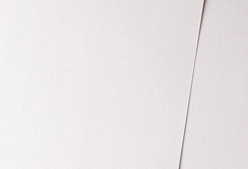 Soft white paper texture with a glossy satin finish and subtle pearlescent shimmer. The delicate...