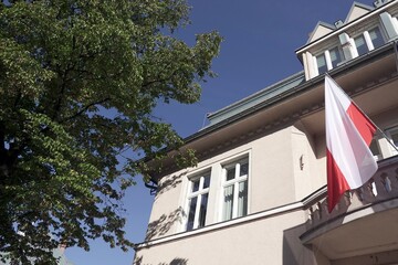 Polish flag on embassy building of Poland