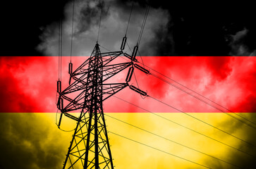 Blackout threat for electricity in Germany, crisis caused by renewables, pylon and German flag