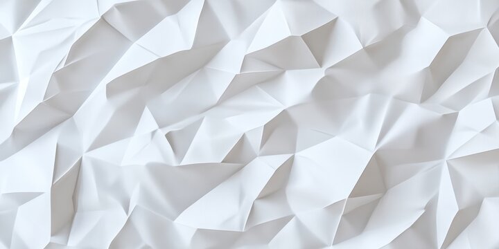 Geometric folds in white paper creating an angular and dynamic texture for contemporary abstract design backgrounds