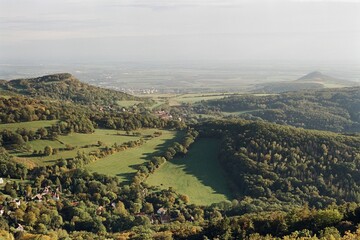 czech central mountains from Varhost in Czechia on 14. October 2024 on color film - blurriness and noise of scanned 35mm film were intentionally left in image