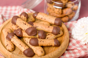 Sticks shortbread dipped in chocolate. Home made cookies.