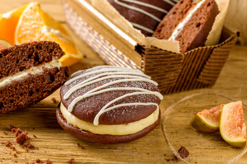 Whoopie pie with orange cream. Delicious homemade dessert.