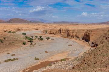 Canyon in a Moroccan plain between the towns of Zagora and Tata