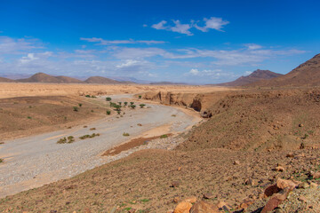 Canyon in a Moroccan plain between the towns of Zagora and Tata