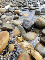 Stones on the seashore, close-up, background