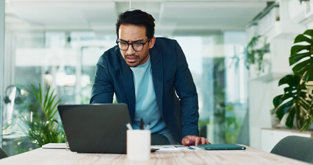 Man, stress and laptop in office for business, banking fraud and finance mistake at desk. Confused accountant, computer and frustrated in accounting agency for admin crisis, economy fail and anxiety