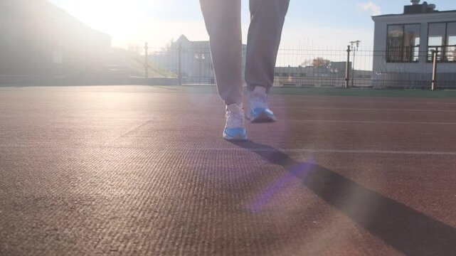 Athlete's feet during training on a skipping rope. Movement and physical fitness are captured
