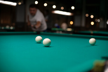 Billiard balls on table before strike.
