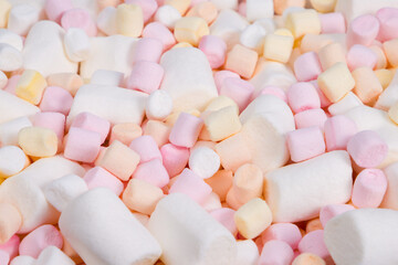 Colorful marshmallows background. Small marshmallows background.