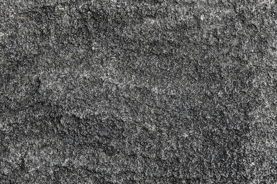 A Diverse Collection of Textures Featuring Fine Dark Sand for Various Creative Projects