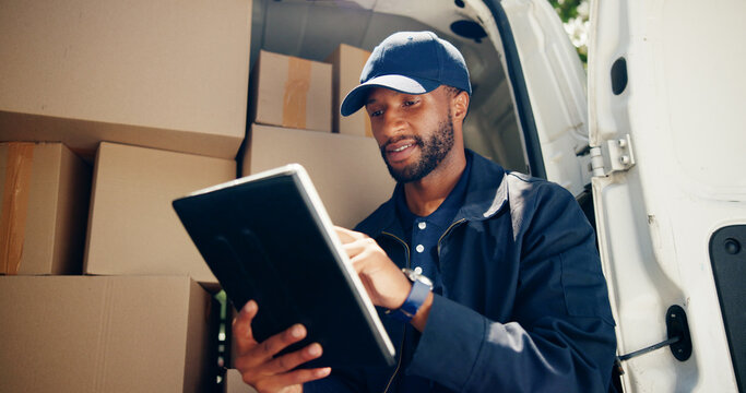 Courier, cargo or man with tablet by van for package distribution, online order checklist or supply chain. Logistics, transport or black driver with digital app for parcel location or inventory check