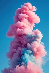 Fototapeta premium Vibrant swirl of pink and blue smoke clouds on a pastel background
