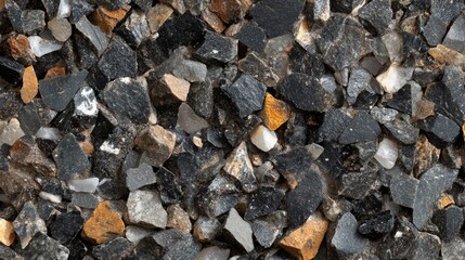 A Collection Of Dark Grey And Brown Stones