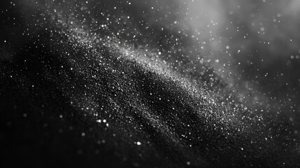 Obraz premium Glittering Particles Floating Over Dark Surface