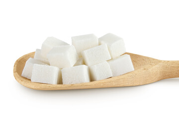 Sugar cubes in a wooden spoon isolated on white background