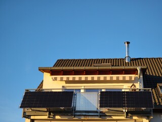 Balcony power plant - solar modules on a stainless steel railing