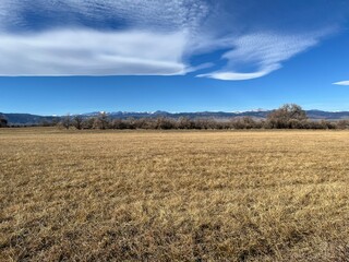 Winter prairie with the Rocky Mountains in the background, Colorado