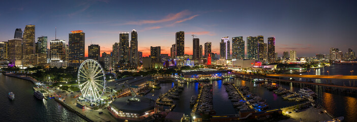 Aerial view of yachts in Miami marina at Bayside Marketplace with reflections in Biscayne Bay water...