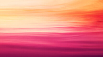 a blended gradient of pink and orange tones transitioning softly over a tranquil water surface  
