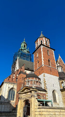Obraz premium Krakow Old Town St. Mary's Basilica Main Market Square St Florians gate and Barbakan Royal Castle St. Joseph's Church
