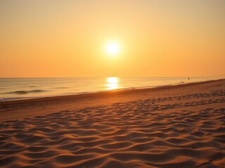 Obraz premium Fine beach sand illuminated by the summer sun, creating a warm and inviting atmosphere, golden, vacation, sunny weather