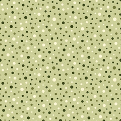 Vector seamless polka dot pattern in olive green shades. The varying sizes dots are displayed on beige and green background. Minimalist design. Perfect for nature concept, textile and packaging