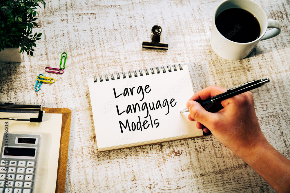 Poster there is notebook with the word large language models. it is as an eye-catching image.