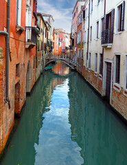 typical canals streets venice italy green water red brick houses magical corners 