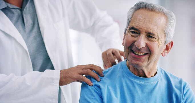 Doctor, elderly patient or shoulder injury with physiotherapist for checkup, exam or visit at hospital. Male person, medical worker and senior client with physio for pain relief, ache or inflammation - Powered by Adobe