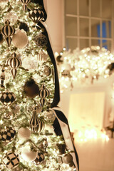 Christmas decorations lights. Modern New Year's decor. Christmas trees with garlands and gifts.