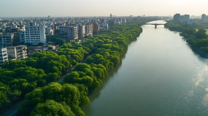 Aerial View of the Scenic Sabarmati River Flowing through the Lush Greenery and Urban Landscape of Ahmedabad, India at Sunset